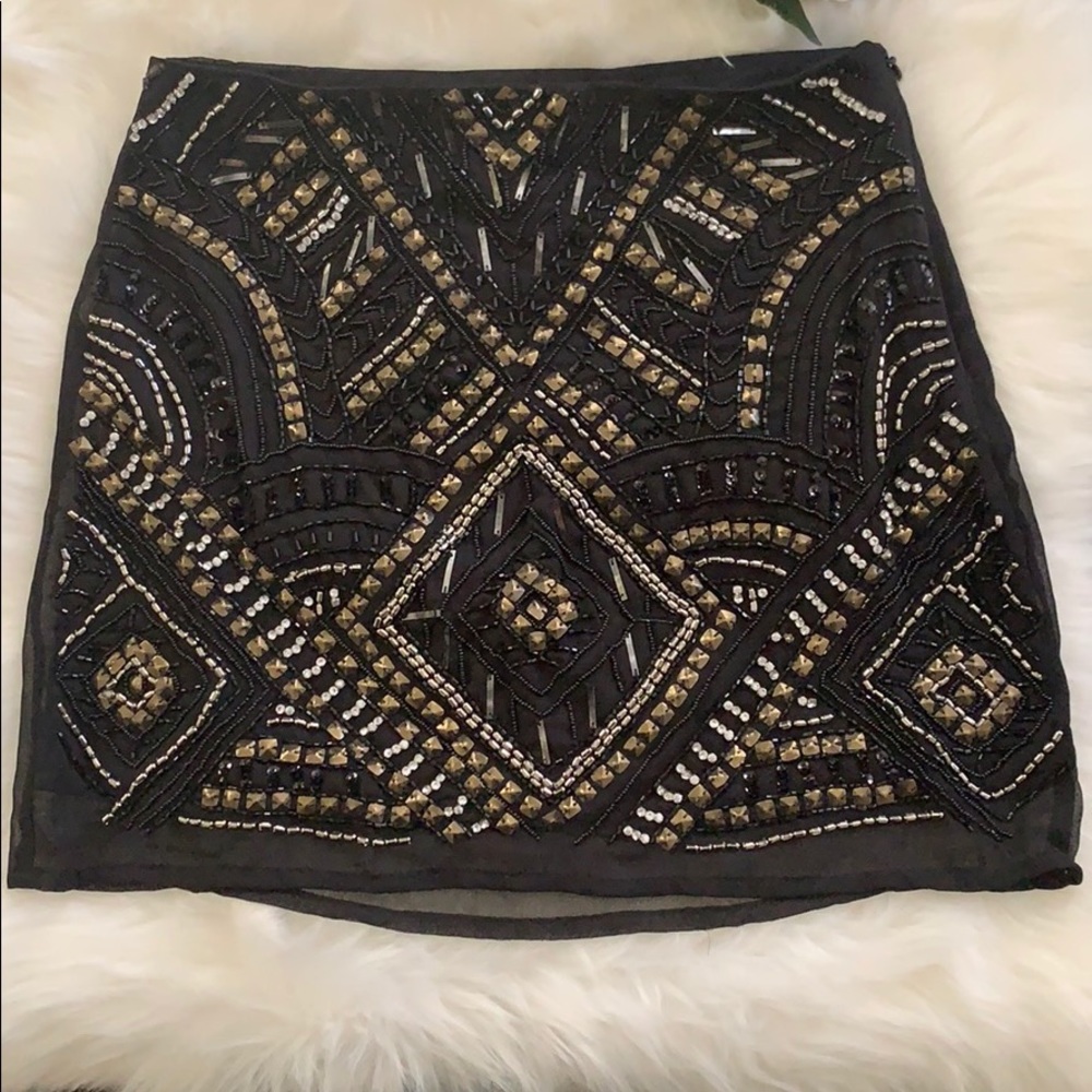 Embellished black mini skirt